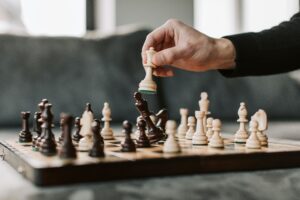 person playing chess to keep their mind nimble